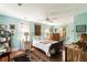 Airy bedroom with lots of light, a ceiling fan, and hardwood floors at 2808 Ion Ave, Sullivans Island, SC 29482