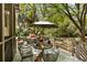 Inviting deck area, great for outdoor relaxation, with dining table and chairs at 2808 Ion Ave, Sullivans Island, SC 29482