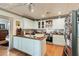 Bright kitchen with wooden countertops, white cabinets, and a center island at 2808 Ion Ave, Sullivans Island, SC 29482