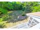 Expansive backyard view from the deck, showcasing lush greenery and lawn at 281 Hawthorne St, Mount Pleasant, SC 29464