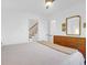 Calm bedroom with a soft color palette and wood floors at 281 Hawthorne St, Mount Pleasant, SC 29464