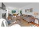 Bright living room featuring hardwood floors and an open floor plan at 281 Hawthorne St, Mount Pleasant, SC 29464