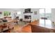 Bright living room featuring hardwood floors, a fireplace, and modern furniture at 281 Hawthorne St, Mount Pleasant, SC 29464