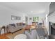 Bright living room featuring hardwood floors and an open floor plan at 281 Hawthorne St, Mount Pleasant, SC 29464