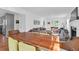 Bright living room and dining area featuring hardwood floors and an open floor plan at 281 Hawthorne St, Mount Pleasant, SC 29464