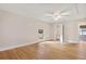 Bright bedroom with hardwood floors and a view of the outdoors through the windows at 298 Summerset Ln, Summerville, SC 29483