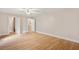 Open bedroom layout with hardwood floors and connecting doors to bathroom and closet at 298 Summerset Ln, Summerville, SC 29483