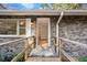 Charming front entrance featuring a brick facade, accessible ramp, and inviting open doorway at 298 Summerset Ln, Summerville, SC 29483