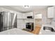 Updated kitchen features stainless steel appliances, sleek white cabinetry, and modern countertops at 298 Summerset Ln, Summerville, SC 29483