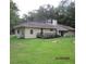 Spacious backyard with a large deck, perfect for outdoor entertaining and relaxation at 302 Summerset Ln, Summerville, SC 29483