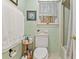 Cozy bathroom with a single window over the commode at 302 Summerset Ln, Summerville, SC 29483