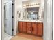 Bathroom showing double vanity and an adjoining room at 302 Summerset Ln, Summerville, SC 29483