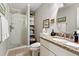Updated bathroom features a glass shower and granite counters at 302 Summerset Ln, Summerville, SC 29483