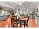 Well-lit kitchen with granite countertops, stainless steel appliances, and a cozy dining area at 302 Summerset Ln, Summerville, SC 29483