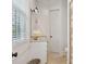 Neutral bathroom with a single sink vanity, a mirror, and shower with curtain at 305 N Civitas St, Mount Pleasant, SC 29464