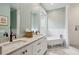 Bathroom featuring double sinks, a clawfoot tub, and white subway tile at 305 N Civitas St, Mount Pleasant, SC 29464