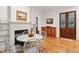Charming breakfast nook featuring a fireplace, built-in shelves, and a wooden table at 305 N Civitas St, Mount Pleasant, SC 29464