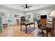 Spacious home office with natural light, hardwood floors, and ample workspace at 305 N Civitas St, Mount Pleasant, SC 29464