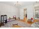 Spacious playroom with hardwood floors and room for toys at 305 N Civitas St, Mount Pleasant, SC 29464