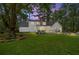Expansive backyard with a well-maintained lawn, mature trees, and an inviting outdoor living space at 309 Huntington Rd, Summerville, SC 29483
