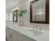Bright bathroom features double sinks, a large mirror, and elegant fixtures at 309 Huntington Rd, Summerville, SC 29483