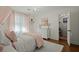 Bedroom with chandelier, pink accents, and closet at 309 Huntington Rd, Summerville, SC 29483