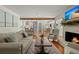 Inviting living room shows fireplace, hardwood floors, sofa, and open-concept design at 309 Huntington Rd, Summerville, SC 29483