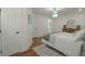 Bright bedroom with hardwood floors, chandelier lighting, and ensuite bathroom at 309 Huntington Rd, Summerville, SC 29483