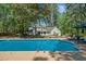 A beautiful backyard pool area provides a relaxing and private escape at 309 Huntington Rd, Summerville, SC 29483