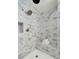 Custom shower features a rainfall showerhead, built-in seat, and decorative marble style tile at 309 Huntington Rd, Summerville, SC 29483