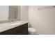 Functional bathroom featuring a single sink vanity with granite countertop and tiled shower at 3308 Comsee Ln, Johns Island, SC 29455