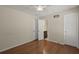 This bedroom features a ceiling fan, hardwood floors, and an ensuite bathroom at 3308 Comsee Ln, Johns Island, SC 29455