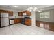 Well-lit kitchen featuring stainless steel appliances and wooden cabinets at 3308 Comsee Ln, Johns Island, SC 29455