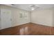 Bright living room with gleaming hardwood floors and natural light at 3308 Comsee Ln, Johns Island, SC 29455