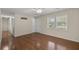 Open living room featuring hardwood floors, a ceiling fan, and natural light at 3308 Comsee Ln, Johns Island, SC 29455