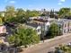 Aerial view showcases the property's rooftops, charming neighborhood, and convenient street access at 34 Pinckney St, Charleston, SC 29401