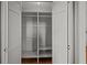 Spacious walk-in closet with built-in shelving for organized storage at 34 Pinckney St, Charleston, SC 29401