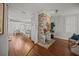 Open-concept living room with fireplace and dining area at 34 Pinckney St, Charleston, SC 29401