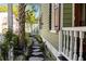 Lush side yard with stone pavers and manicured landscaping at 34 Pinckney St, Charleston, SC 29401