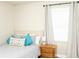 Serene bedroom with a comfortable bed, side table, and natural light from the window at 407 Tammie Ave, Goose Creek, SC 29445