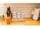 Kitchen counter with decor, wooden cutting board, knives, and cooking essentials at 407 Tammie Ave, Goose Creek, SC 29445