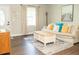 Bright living room with hardwood floors, neutral walls, comfortable seating, and natural light at 407 Tammie Ave, Goose Creek, SC 29445