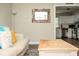 Cozy living room with hardwood floors, stylish decor, and a view into the bright kitchen at 407 Tammie Ave, Goose Creek, SC 29445