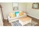 Comfortable living room featuring stylish decor, hardwood floors, and lots of natural light at 407 Tammie Ave, Goose Creek, SC 29445