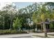 Community playground with a picnic shelter surrounded by lush landscaping with green spaces at 407 Tammie Ave, Goose Creek, SC 29445