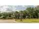 Street view of memorial park with flags and beautiful landscaping, and well-maintained surroundings at 407 Tammie Ave, Goose Creek, SC 29445