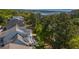 An aerial view of the home featuring an outdoor deck overlooking a waterway, and mature landscaping at 4082 Blackmoor St, Mount Pleasant, SC 29466