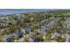 Aerial view showcasing a waterside community with winding streets, ponds, and marsh views at 4082 Blackmoor St, Mount Pleasant, SC 29466