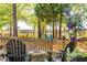 Fire pit and Adirondack chairs offering a cozy outdoor space and serene views at 4082 Blackmoor St, Mount Pleasant, SC 29466