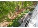 Well-maintained backyard with a wooded perimeter and outdoor seating area at 4082 Blackmoor St, Mount Pleasant, SC 29466